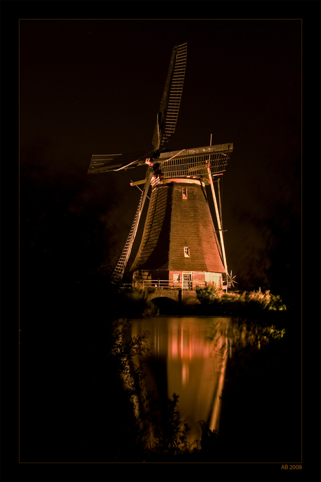 Windmill in floodlight.