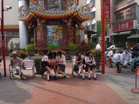 Chinese schoolgirls between men