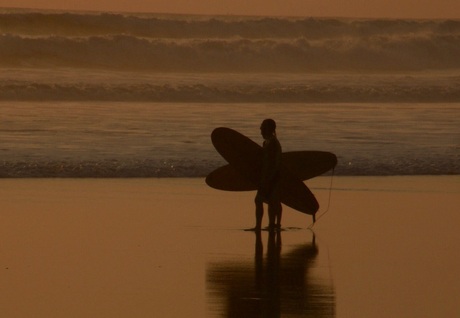 Surfers crossing