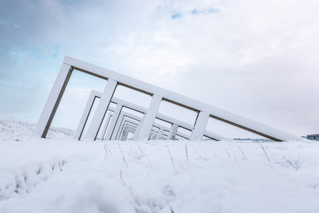 Golfbrekers in de sneeuw