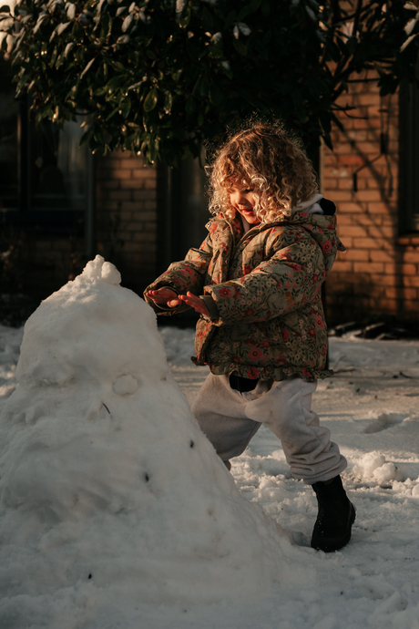 "Zullen we een sneeuwpop maken?"