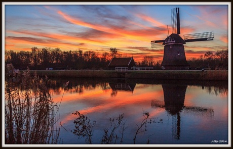 De Sluismolen zonsondergang.