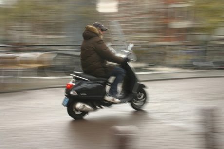 Rijdende scooter