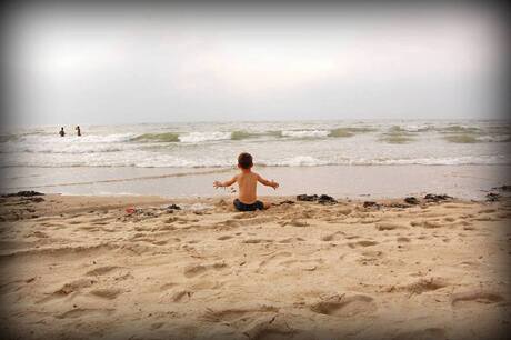 Een zijn met de zee en het zand.