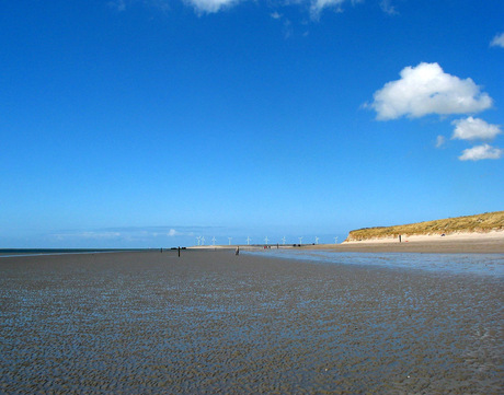 Lucht, duinen en strand