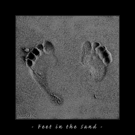 Feet in the sand