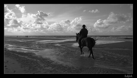 on the beach riding...