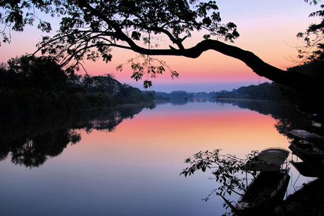 DAWN AT THE RIVERSIDE IN CHIANG MAI THAILAND