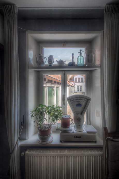 Het venster met de weegschaal