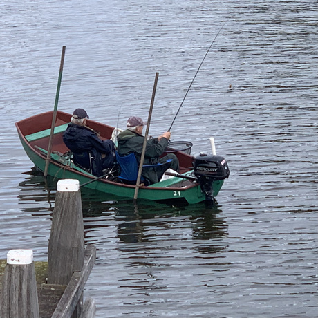 Vissers in een bootje