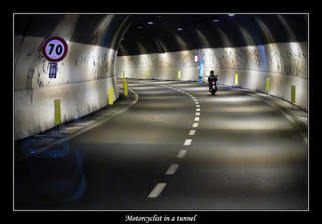 Motorcyclist in a tunnel