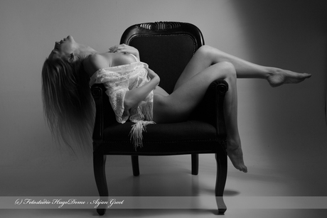 Artnude in a chair