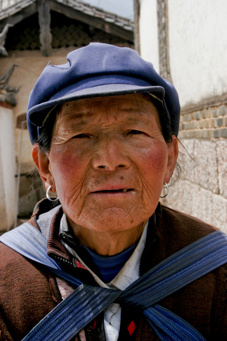 old lady with blue cap