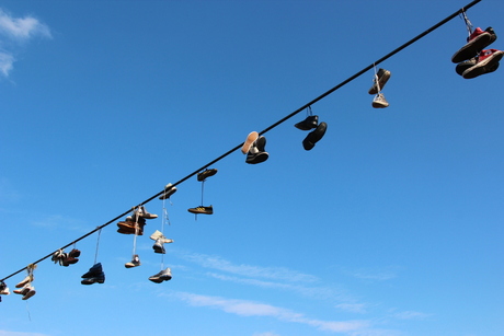 Shoes on a wire