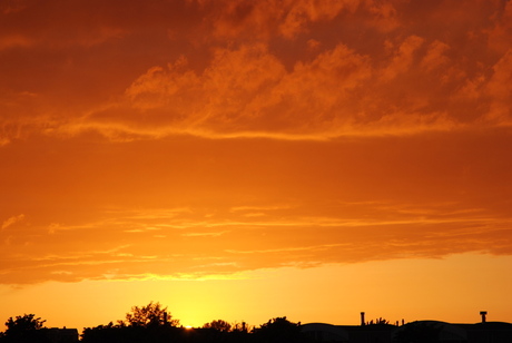 ondergaande zon vanaf het dakterras