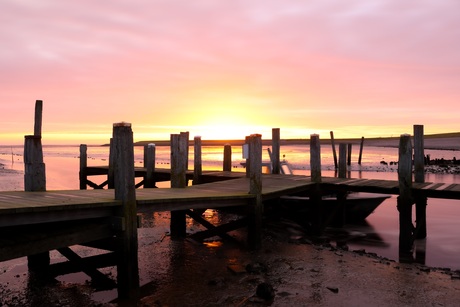 Zonsopkomst boven de steiger