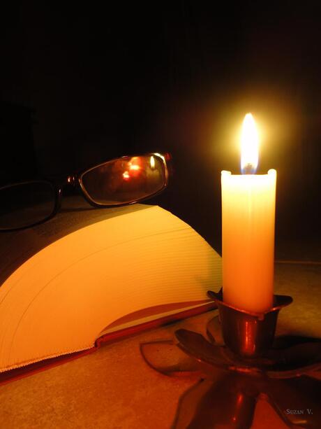 Reading by candlelight