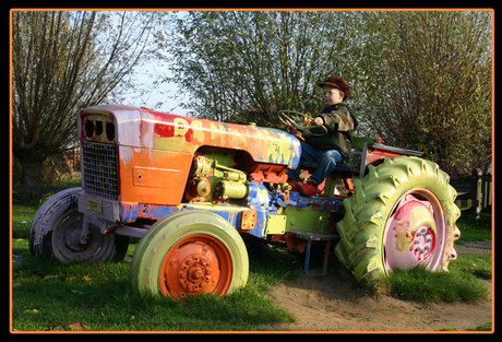 Marc op de tractor