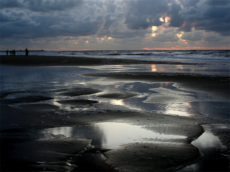 zonsondergang op t strand