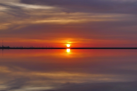 Spiegel op het strand