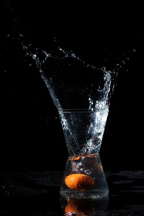 Splashfoto met mandarijn