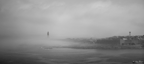 Lighthouse in the clouds