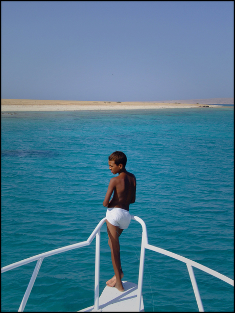 Egyptische jongen op Boot