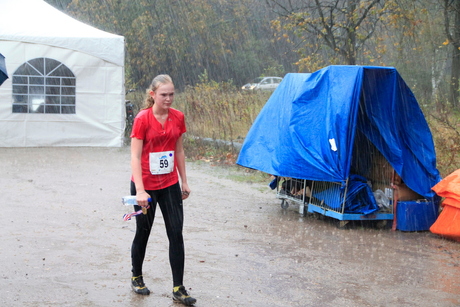 run uitgelopen in de stromende regen