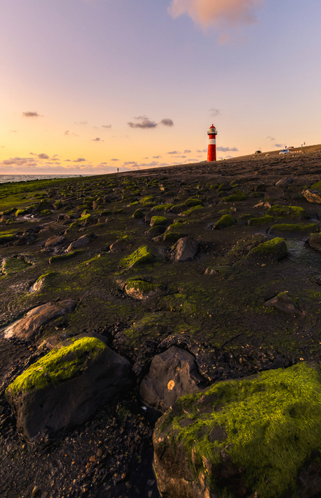 Vuurtoren het Noorderhoofd tijdens de zonsondergang