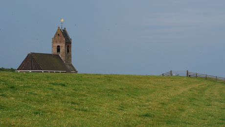 Kerk achter de dijken