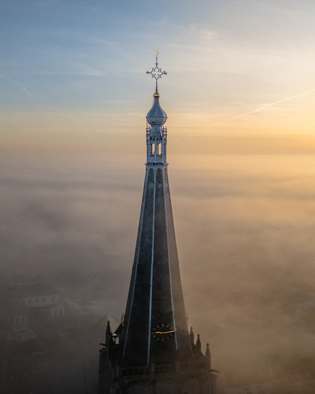 Spire above the mist