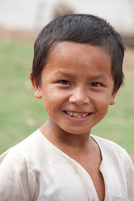 Faces of Cambodja -24- lachende jongen