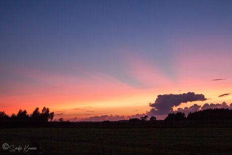 Ondergaande zon bij de Lijen