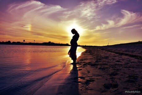 Baby belly in the sunset