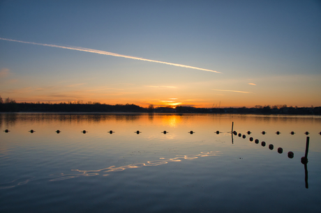 Zonsopkomst bij een meer in Brabant