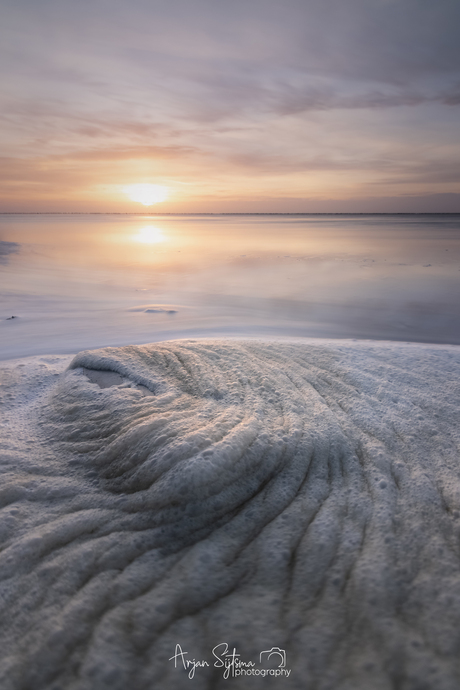 Schuimkragen aan het Wad...