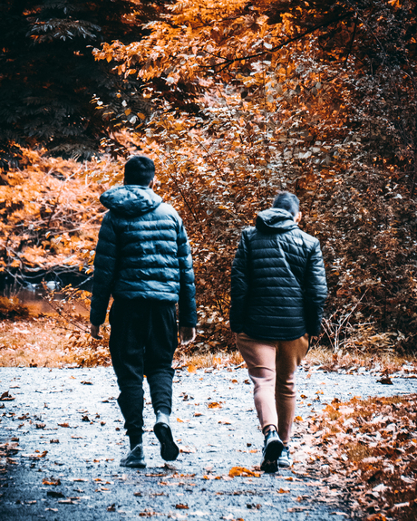 Two boys having an autumn walk