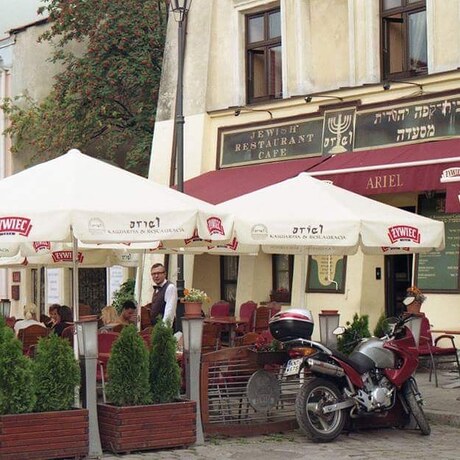 The waiter watched me