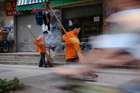 Bicycle & cleaning people