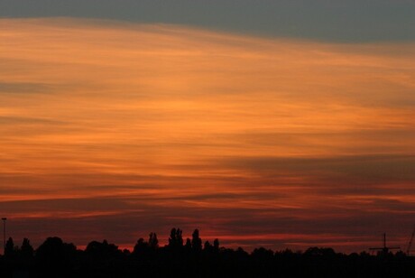 Zonsondergang langs de wijde aa