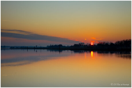 Zonsondergang aan de Maas in Belfeld