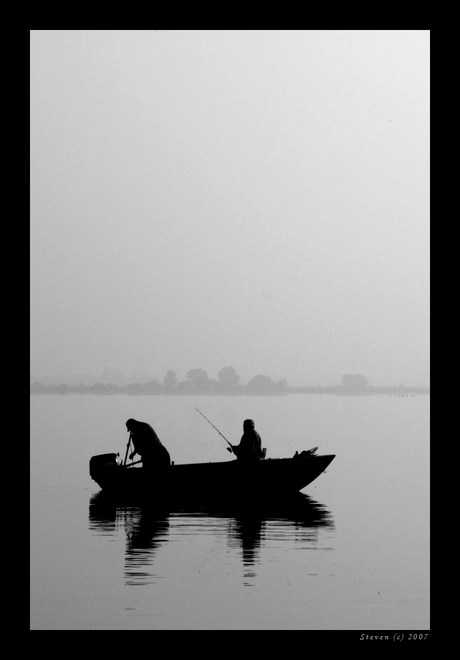 vissers in de mist