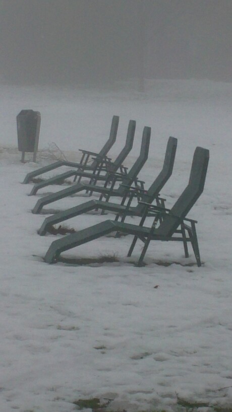 Sun loungers in the snow.