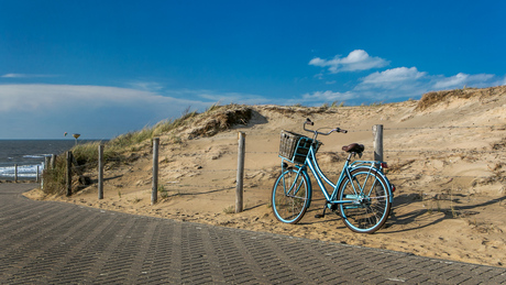 Blue bike at the beach