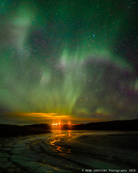 Lady Aurora above the Langá river, outside Borgarnes. Iceland