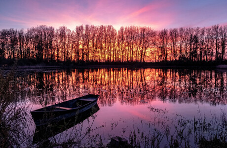 Zonsondergang aan de Maas