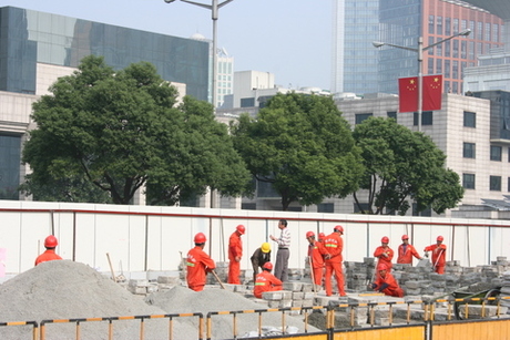 hoeveel werken er hier in Sjanghai?