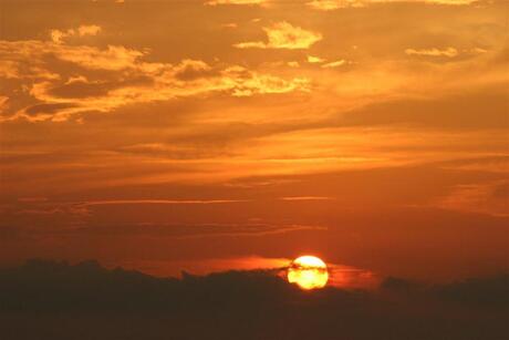 Zonsondergang op zee