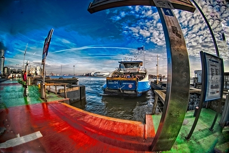 the quay bleeds and the ferry laughs