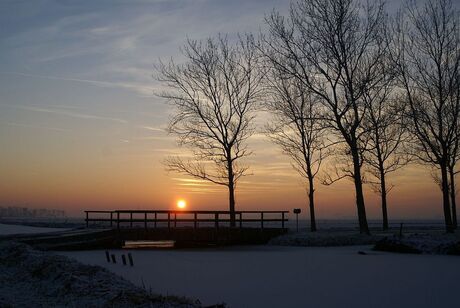 Zonsondergang polder